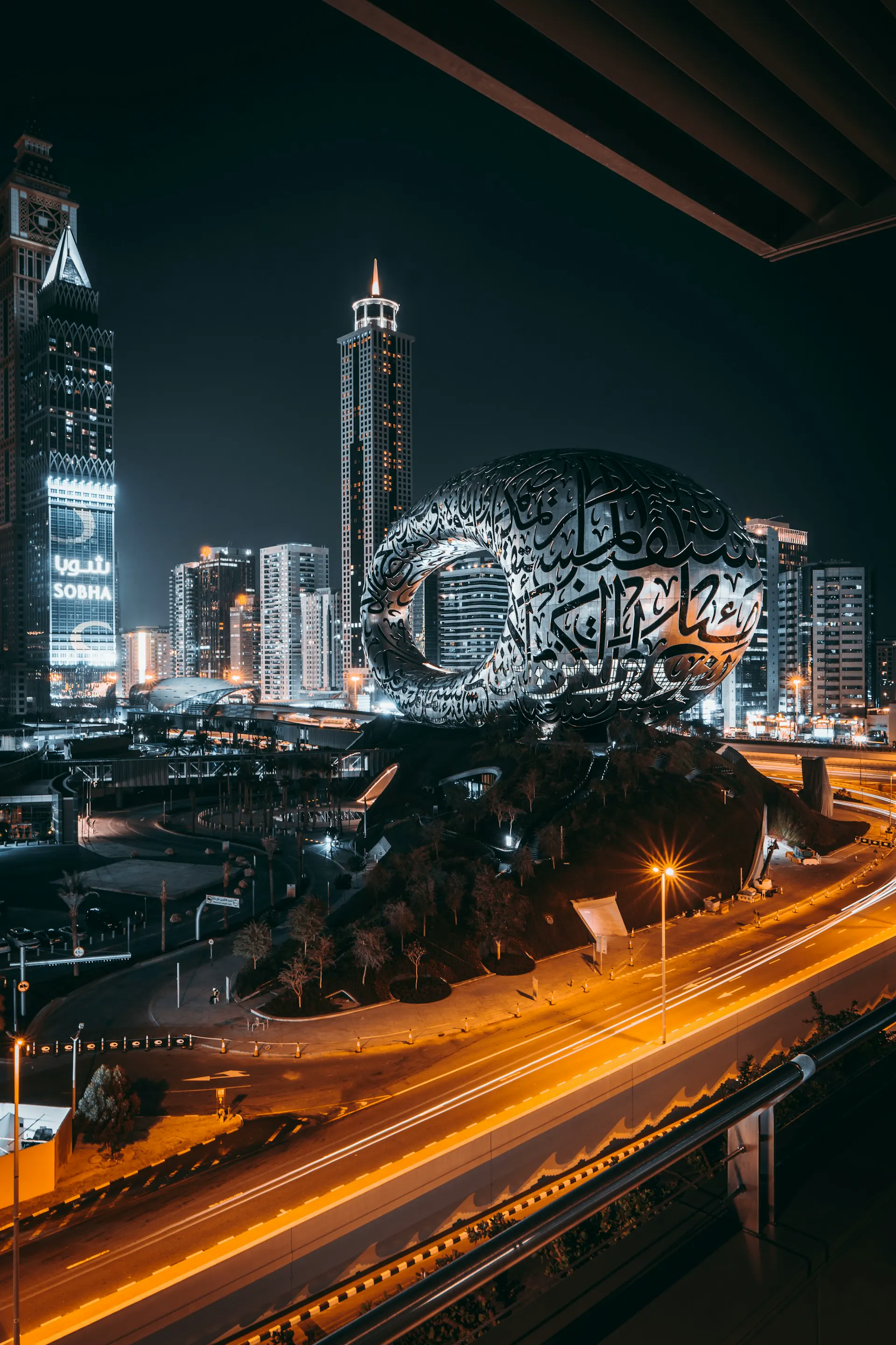 Dubai Museum of the Future at night with light trails